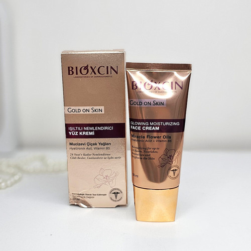 كرم مرطوب كننده و شفاف كننده معجزه بيوكسين Bioxcin مدل Gold On Skin